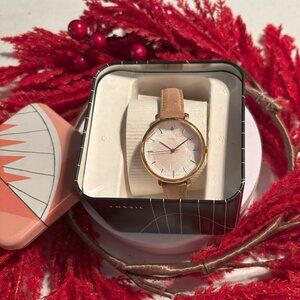 Fossil Gold Casing with Gold Accents and a Light Tan buckle Strap